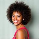 Smiling portrait of a guest speaker, radiating positive energy