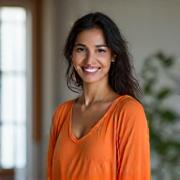 Portrait of Maya, a certified Hatha and Restorative Yoga instructor