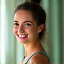 Headshot of Sarah, a warm and empathetic female yoga instructor, looking approachable.